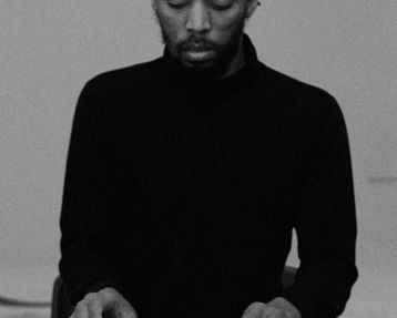Time Zones, still from music video, from the album An Evening with Christian Nyampeta, Radius Records, 2020.
Nyampeta - Time Zones, still from music video, from the album An Evening with Christian Nyampeta, Radius Records, 2020.